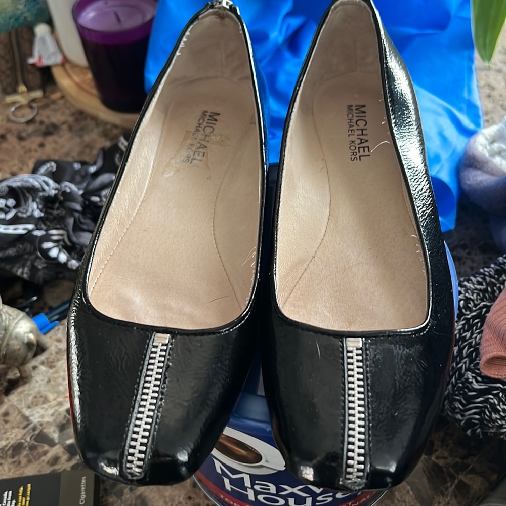 Uniquely crafted MK Zipper detail flats